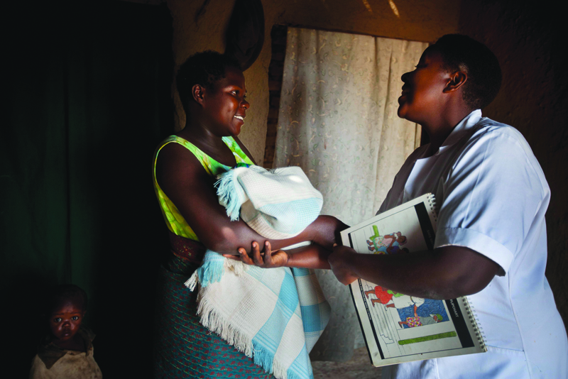 A midwife and a mother come together in Uganda