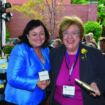 Louise Fitzpatrick '63 receives a medallion on her 50th from Dr. Patricia Davidson, dean-designate.
