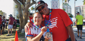 Alex Gogue, a bicyclist in the 2015 Special Olympics, with her dad, Alex Gogue